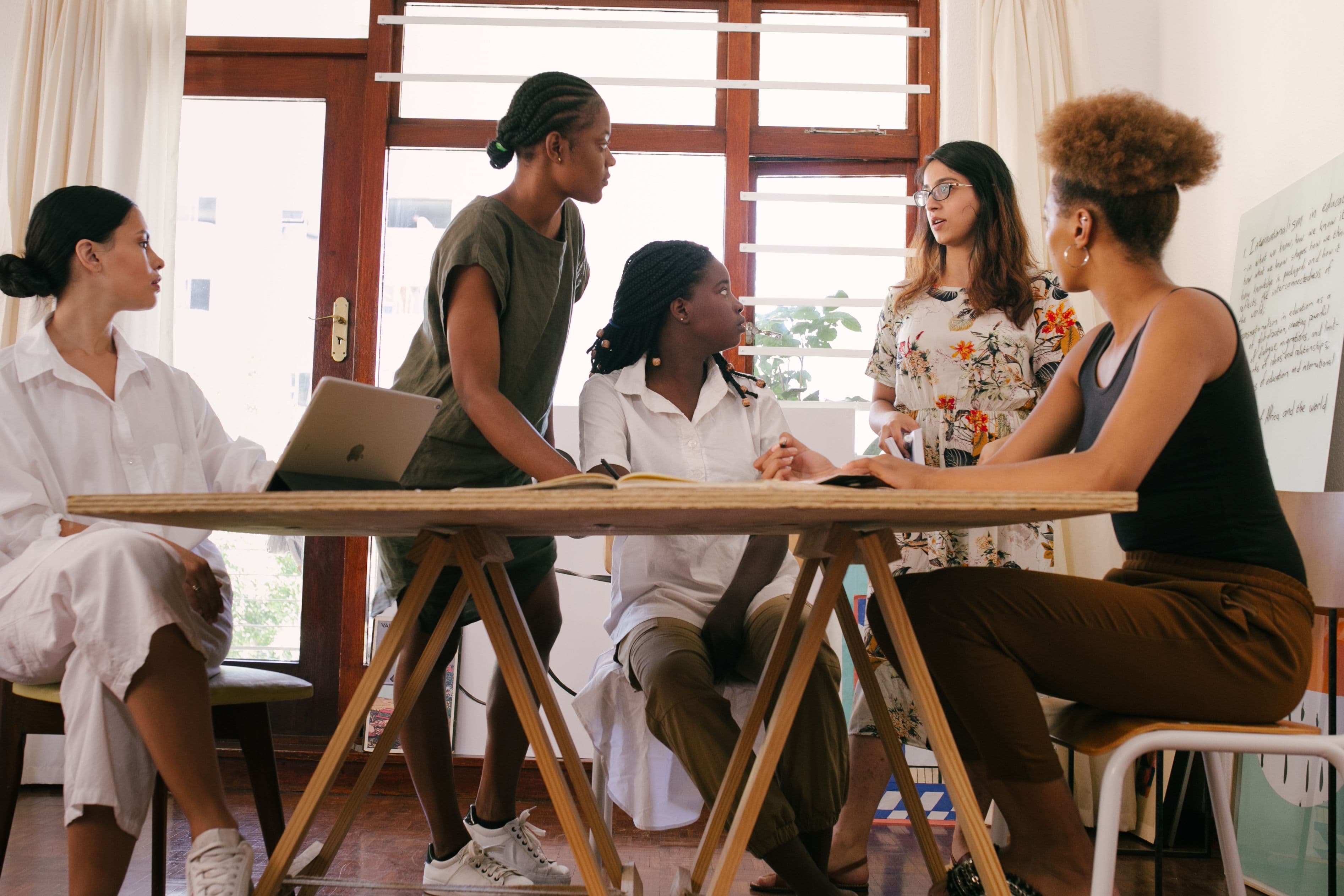 Founders reviewing work together during a meeting